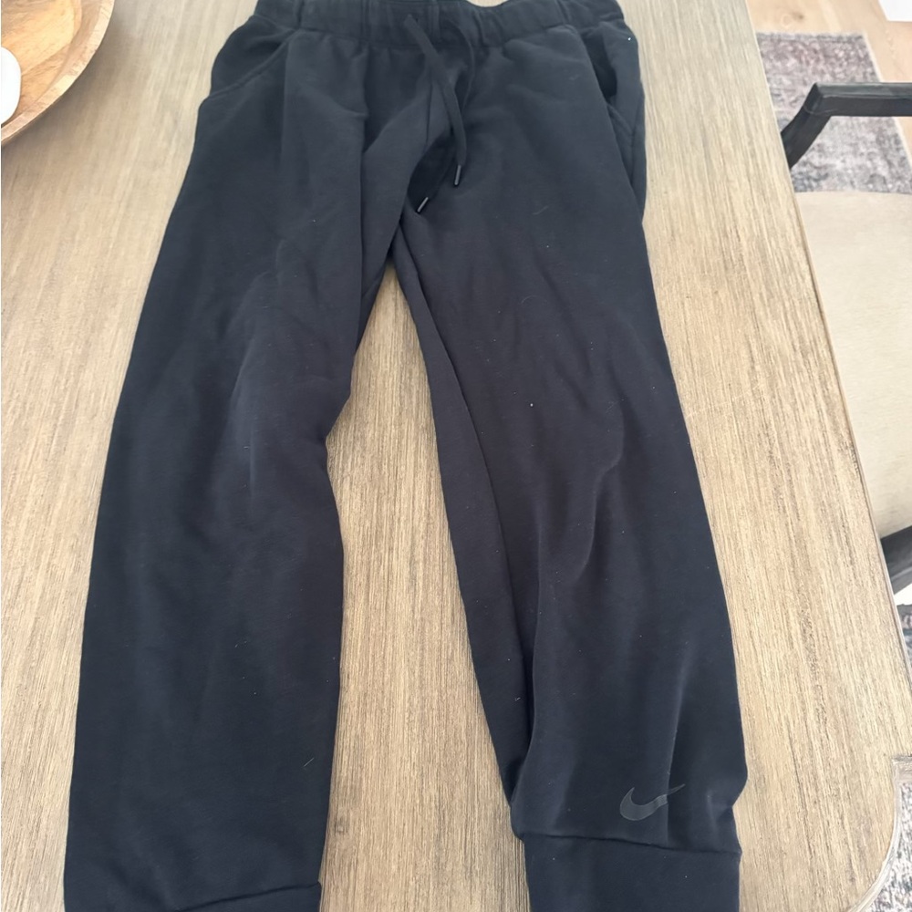 Nike Black Track Pants with Elastic Cuffs and Tapered Legs